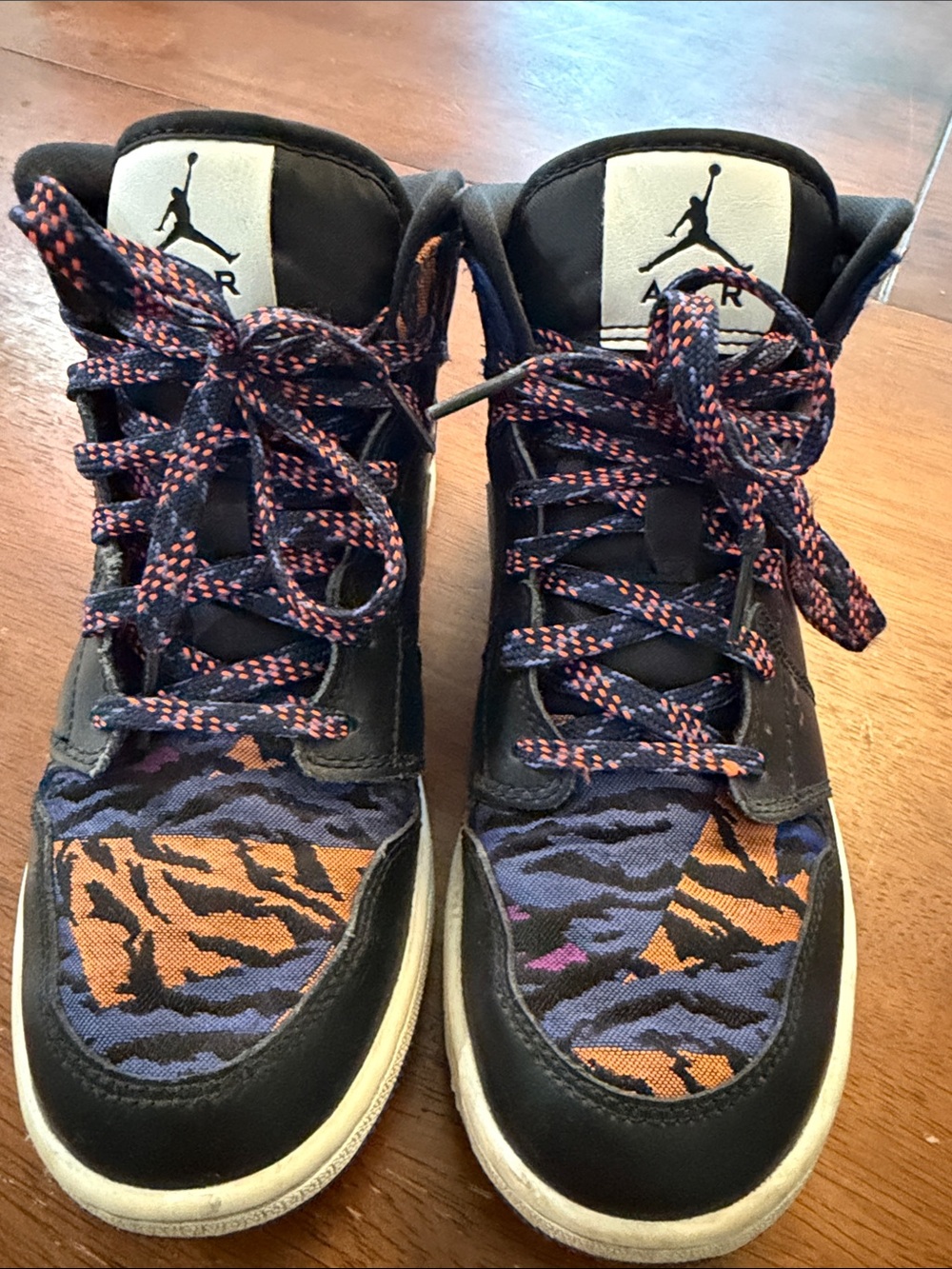 Nike Kids High-Top Sneakers in Black with Orange & Blue Pattern